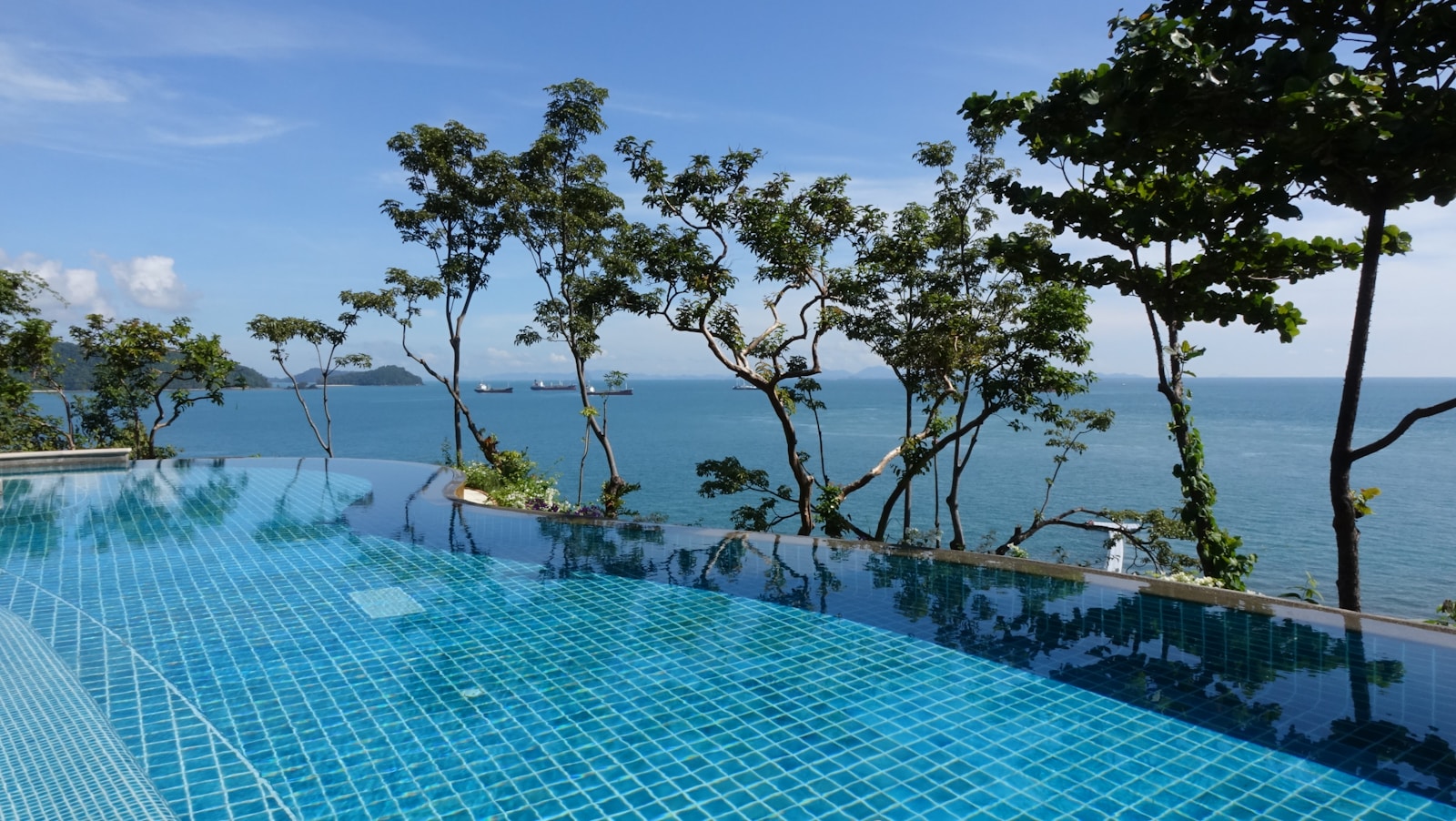 Luxury infinity pool overlooking the Andaman Sea in Phuket