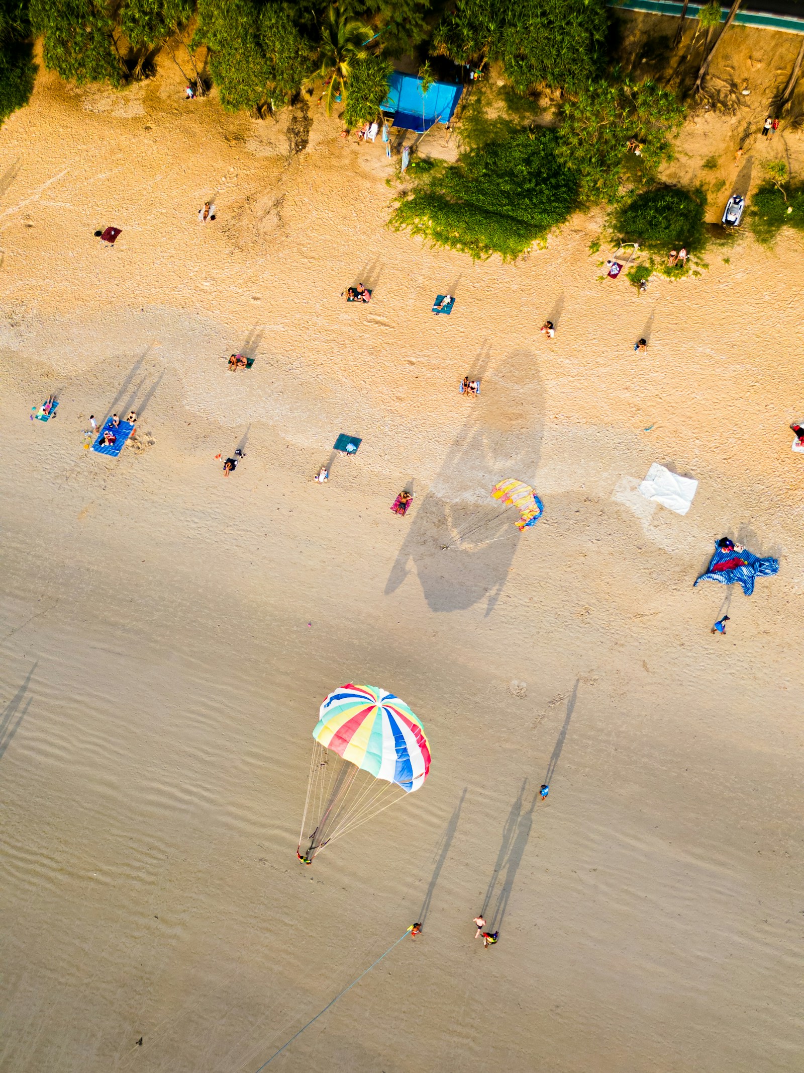 Kata Beach with parasailing and sandy shoreline