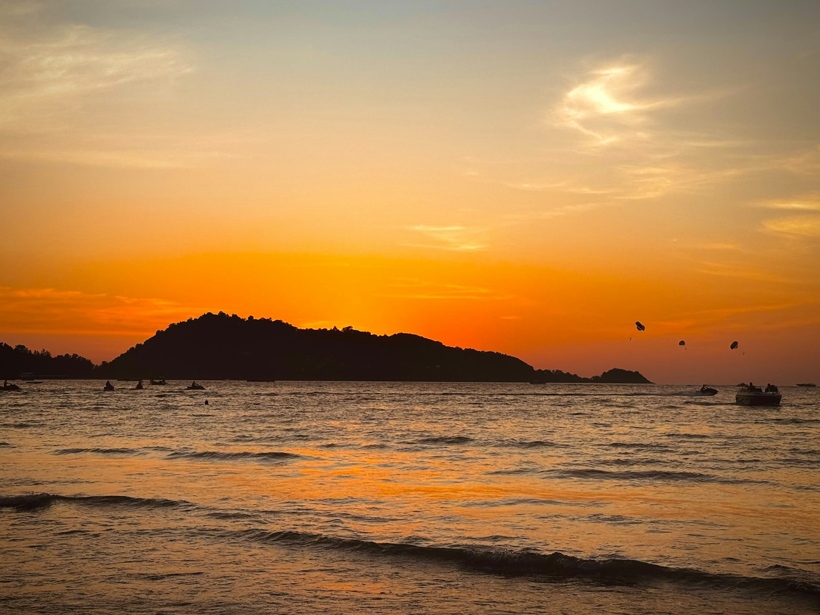 Sunset over Patong Beach with calm Andaman Sea
