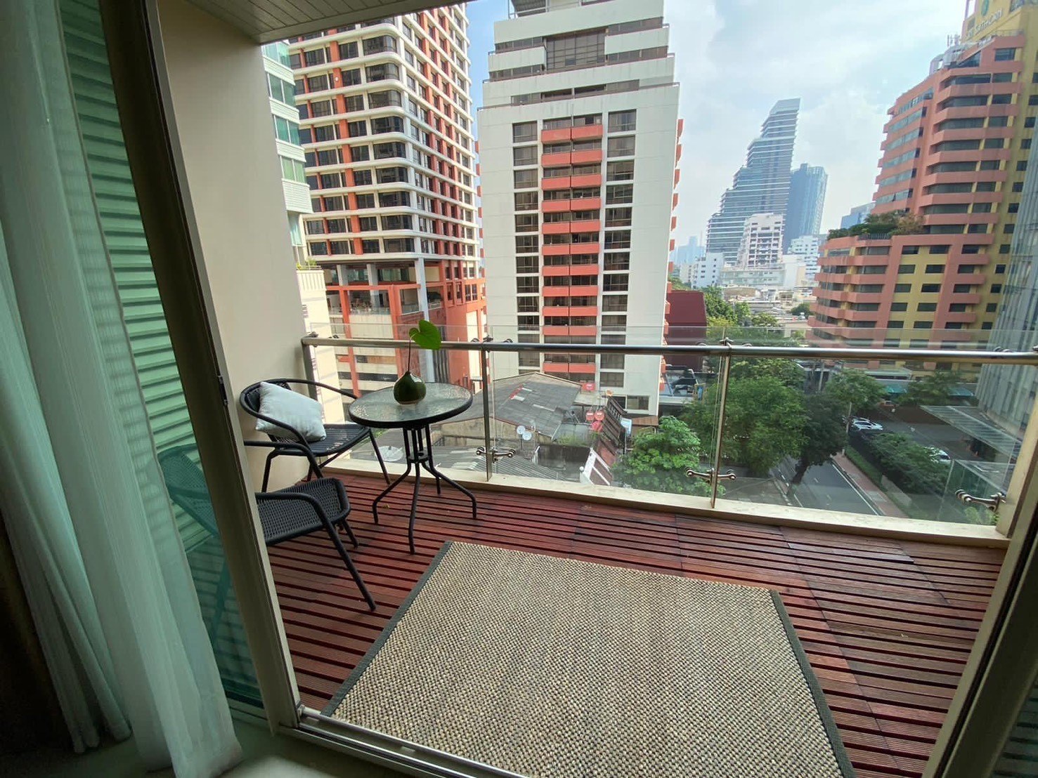 one huge bedroom for rent in Silom. Upscale building. Big balcony.